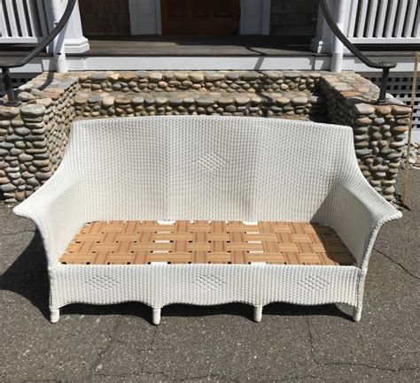 A lloyd loom sofa, synonymous with classic english style.<br /> perfect for the garden room or conservatory, this sofa features the vintage look. Antique Lloyd Loom Sofa For Sale at 1stdibs