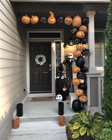 Halloween Front Porch Decor With Black Door Via Disneyaddictslivehere
