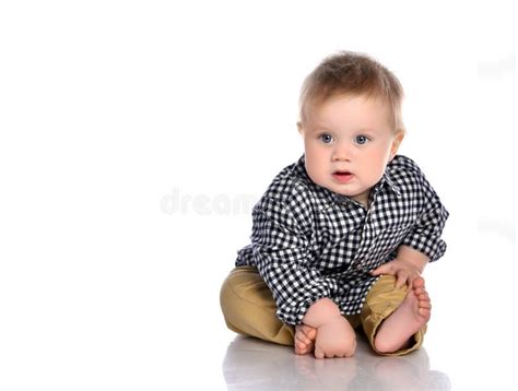 Portrait Of A Little One Year Old Baby Boy Crying On A White Background