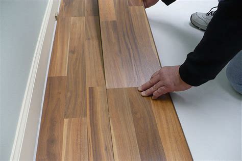 Installation instructions floating wood floors on a concrete slab with a suspended ceiling using 2.5mm acousticork. DIY: Floating floors