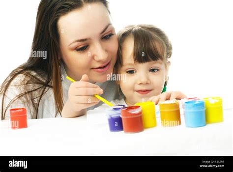Happy Mother And Daughter Painting Together Stock Photo Alamy
