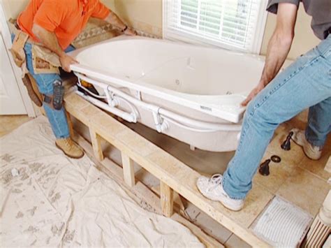 A whirlpool bathtub with jacuzzi jets enables a user to direct the flow of water on joints and muscles that need therapy, in the comfort of his bathroom. Claw Foot Tub Installation: Surround Demolition | how-tos ...