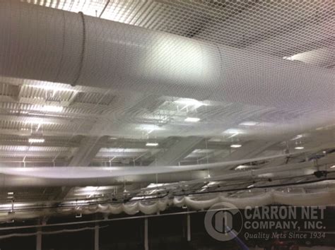 Basketball is a team sport in which two teams, most commonly of five players each, opposing one another on a rectangular court, compete with the primary objective of shooting a basketball (approximately 9.4 inches (24 cm) in diameter) through the defender's hoop. Carron Net Company, Inc. | Ball Barrier Nets