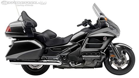 If that's what you're after, honda's gold wing f6b is your kind of bike. 2002 Honda GL 1800 Gold Wing: pics, specs and information ...
