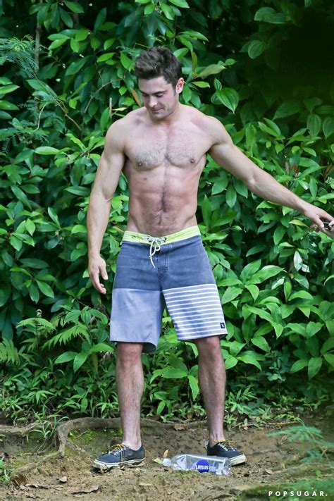 Shirtless Zac Efron On A Rope Swing POPSUGAR Celebrity Photo