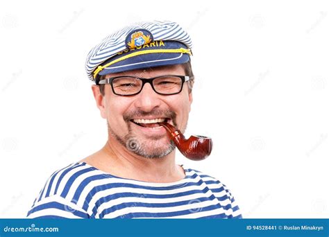 A Man Sailor In A Cap With A Smoking Pipe In Front Of A White Ba Stock Image Image Of People