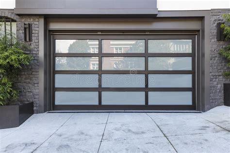 Garage doors offered at low prices free shipping*. 2 Car Garage Door With Frosted Glass Stock Photo - Image ...