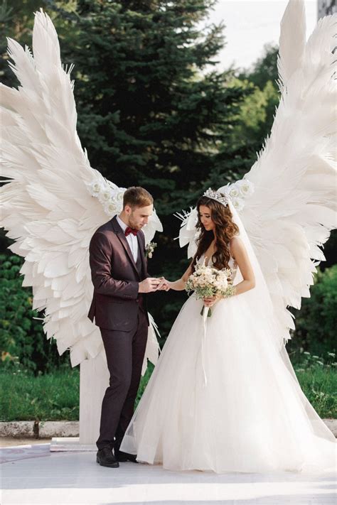 Giant Angel Wings White Background At The Wedding Ceremony Party