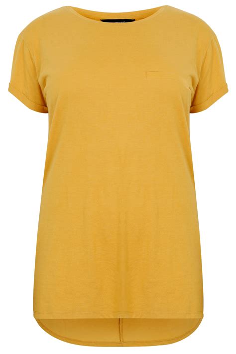Excellent quality print adds statement to casually. Mustard Yellow Pocket Detail T-Shirt With Dipped Hem plus ...