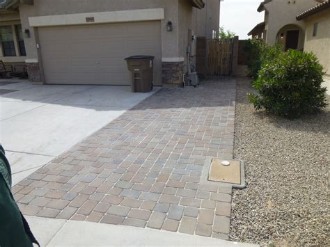 This driveway carves an elegant s curve diagonally across the property and shows off the house as you traverse the gentle slope toward the front door. Paver Driveway Extension Call us for free estimate! 623-776-5314 | Driveway pavers extension ...