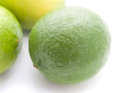 Whole Fresh Green Limes Free Stock Image