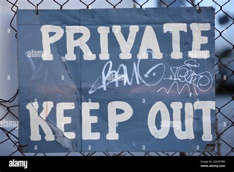 Private Keep Out Sign On Wire Fence Stock Photo Alamy