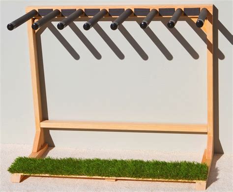 For those who travel around town by bicycle, they know riding with a surfboard under the arm can be cumbersome and awkward. Grassy 7 self standing surfboard rack | Surfboard rack, Surfboard rack diy, Surfboard storage