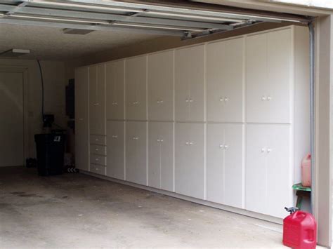 At garage solutions, we pride ourselves on custom cabinet system design and professional installation. Bath & Utility Cabinetry | Garage cabinets, Garage ...