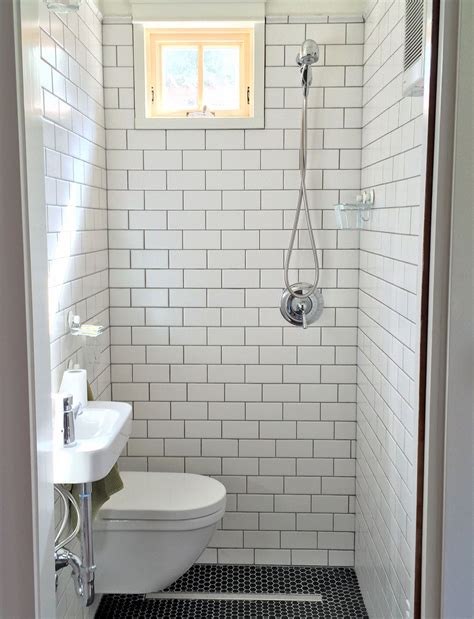 Tiny Bathroom Wall Hung Toilet And Sink Subway Tile Black Hex Floor Tile Strip Drain