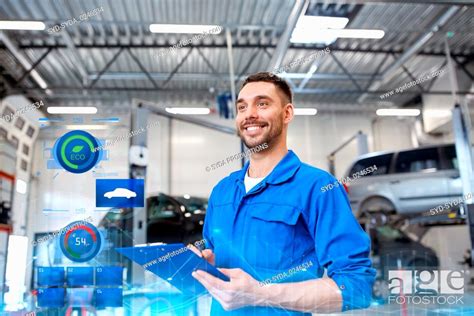 Happy Mechanic Man With Clipboard At Car Workshop Stock Photo Picture