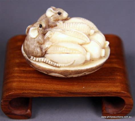 Founded as the netsuke kenkyukai society in 1975, membership in the society includes: A signed Japanese ivory netsuke of Mice with Corn, Meiji ...