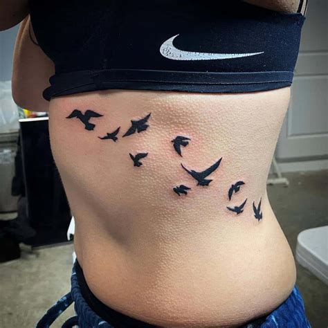 Top 156 Birds Tattoo On Ribs