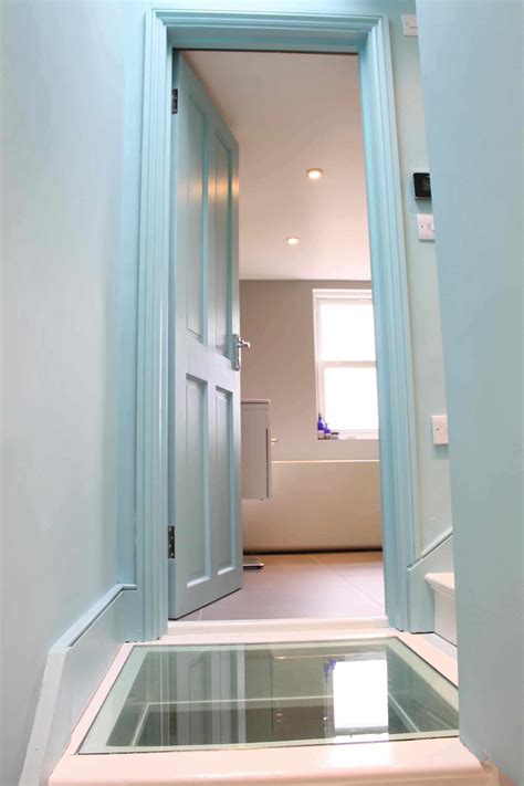 Built in timber framed carcassing and finished with plane tile hanging to the outside. Loft conversion staircases - a floor with a view | Simply Loft