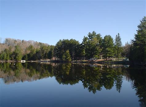 .muskoka woods sports camp on lake rosseau, ontario, i'm convinced that muskoka woods this is a great reason to sign up for muskoka woods this summer! Muskoka woods | Muskoka Woods lake on a calm day of April ...