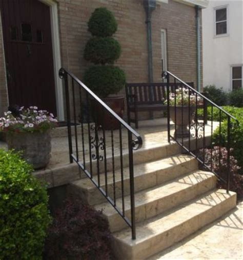 Hand rails shall be provided at the top of both sides of each ladder and recessed steps and shall extend over the coping or edge of the deck. This iron stair railing looks so nice! My husband and I ...