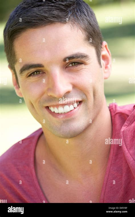 Outdoor Portrait Of Smiling Young Man Stock Photo Alamy