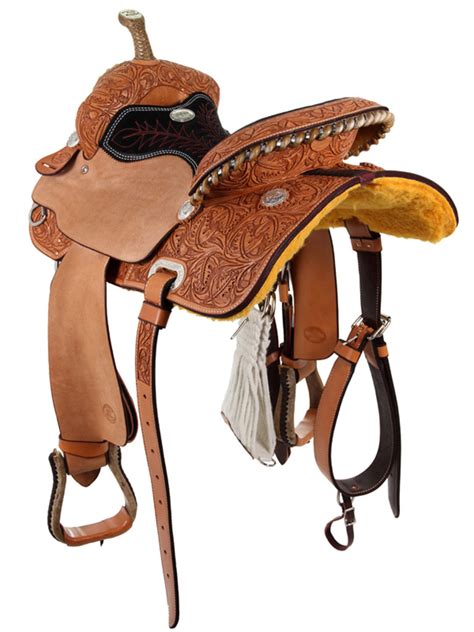 This one says it is a lynn mckenzie on the horn cap. 14" to 16" Billy Cook Half Breed Barrel Saddle 2010