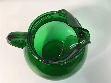 vintage green glass pitcher rould large emerald green pitcher w inique handle retro home