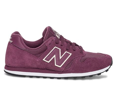 Baskets new balance 997h en toile et cuir bleu marine à détails blancs et rouges. Basket NEW BALANCE violine cuir velours
