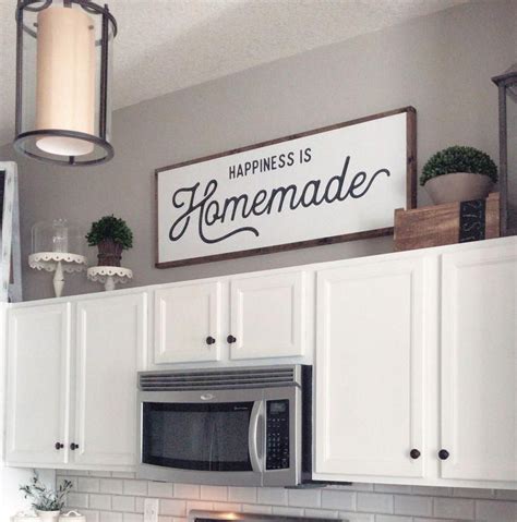 10 Decorating Ideas For Above Kitchen Cabinets Andchristina 18