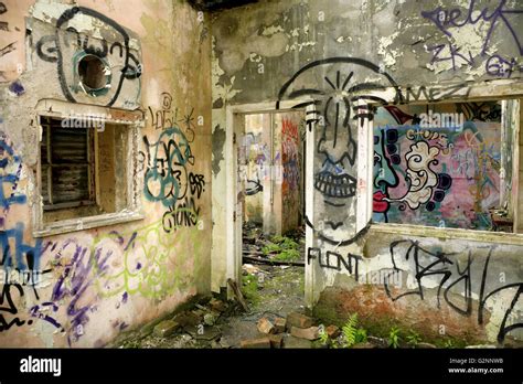 Graffiti And Vandalism In Abandoned Derelict Building Stock Photo Alamy