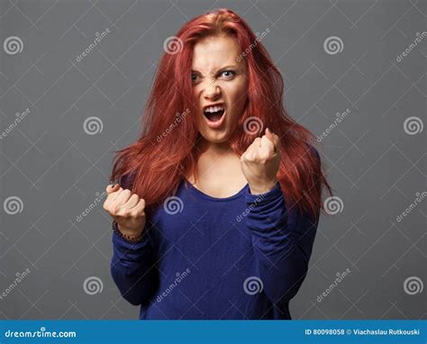 Young Redhead Woman Showing The Anger Stock Photo Image Of Emotional