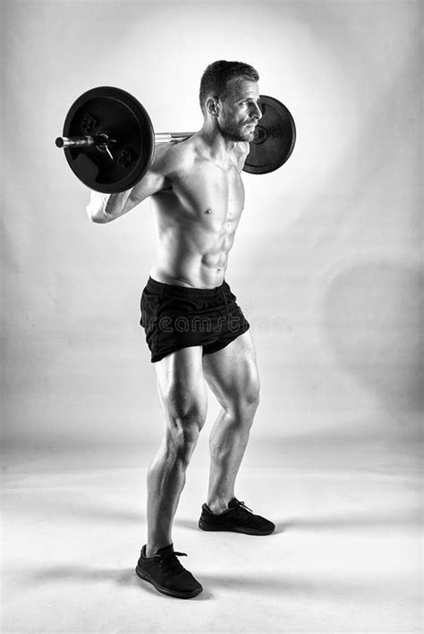 Man Doing Squats With Barbell Stock Image Image Of Fitness Legs