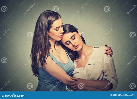 Sad Unhappy Young Woman Being Consoled By Her Friend Stock Photo