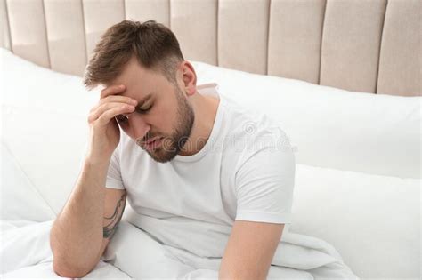 Young Man Suffering From Migraine Stock Photo Image Of Anxious Pain