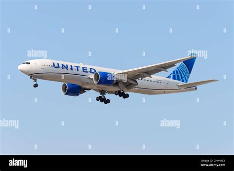 United Airlines Boeing 777 Aircraft Landing Airplane Wearing The New