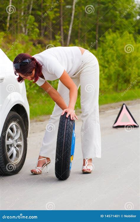 Woman Trying To Change The Wheel Stock Image Image Of Female Pretty