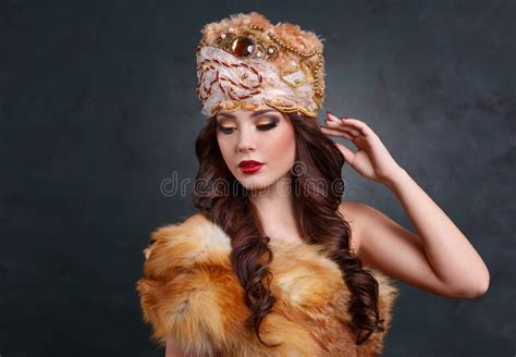 Queen In Royal Dress Girl In Royal Hat And Fur Coat Stock Image