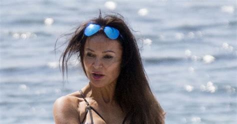 Lizzie Cundy Gets Very Cheeky In Tiny String Bikini Showing Off Her Toned Bod Mirror Online