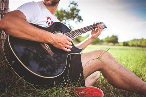 Guy Playing Acoustic Guitar In Nature Free Stock Photo Picjumbo
