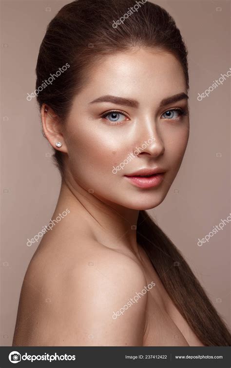 Beautiful Young Girl With Natural Nude Make Up Beauty Face Stock
