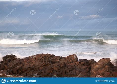 Powerful Sea Waves Crushing To The Rocks On The Shore Stock Photo