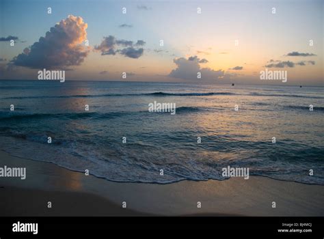 Sunset On Beach In Barbados Stock Photo Alamy