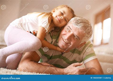 Grandpa With His Granddaughter Playing Stock Image Image Of Girl