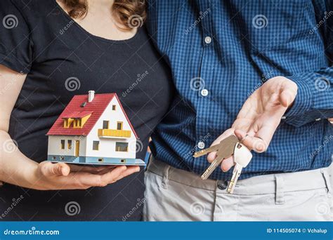 Young Happy Couple Is Buying New House Stock Photo Image Of Happy