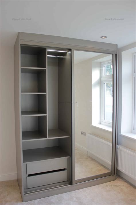 Sliding wardrobes with mirrors use luxury mechanisms for that smooth soft touch feel with a seamless finish and look. Fitted sliding mirror door wardrobe Putney | i-Wardrobes ...