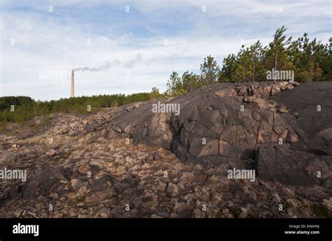Pollution Has Blackened Exposed Rock In Sudbury Near The Vale Mining
