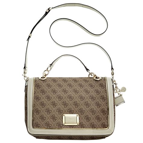 It has a cool & striking color. Lyst - Guess Guess Handbag Reama Top Handle Flap Shoulder ...