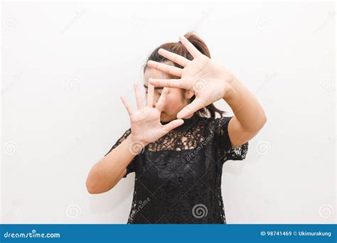 The Woman Put Her Hands Up In Defense Afraid Of Something Stock Image