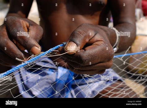 Stock Image Of Indian Tribal Fishermans Hands Fishers Repairing Their
